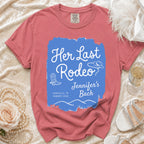 Coral t-shirt with "Her Last Rodeo Jennifer's Bach" in blue text and Western graphics.