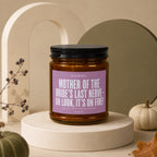 Amber candle with purple label: "Mother of the Bride's Last Nerve"