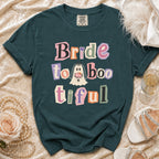 Dark green t-shirt with "Bride to boo tiful" and a ghost graphic.