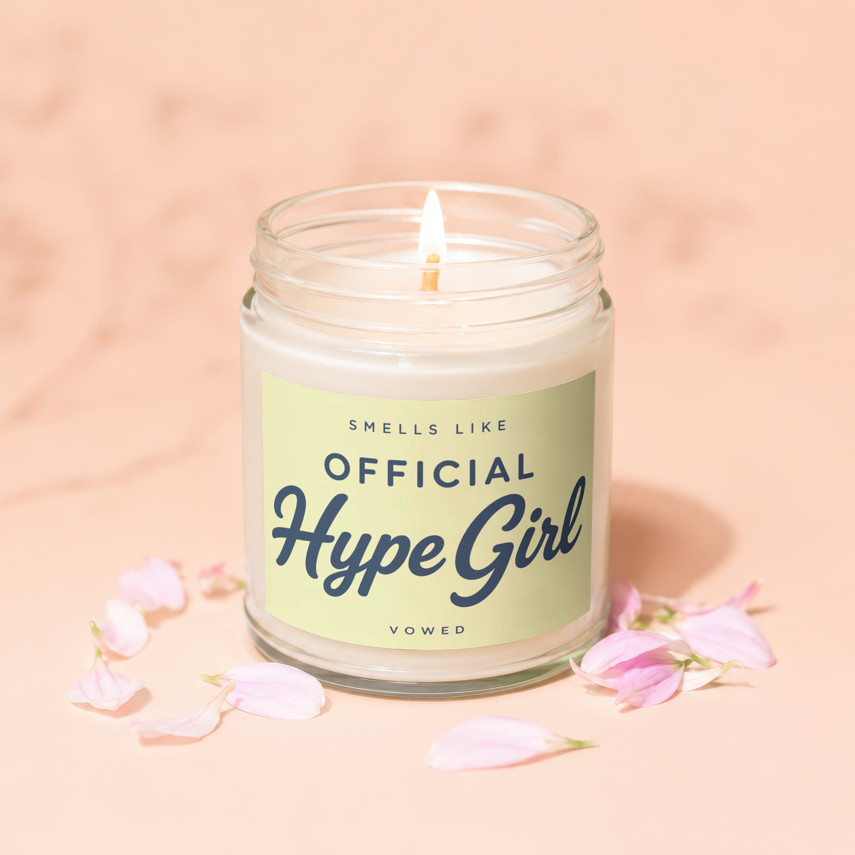 Jar candle with "Smells Like Official Hype Girl" text and scattered pink petals.