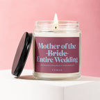 Candle reads "Mother of the Bride Entire Wedding" on a pink background.
