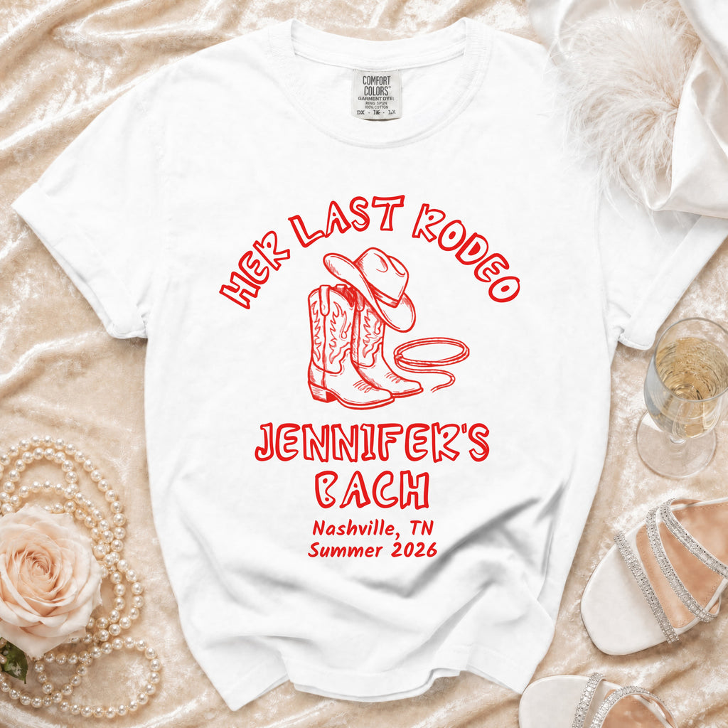 White t-shirt with "Her Last Rodeo Jennifer's Bach Nashville Summer 2026" text.