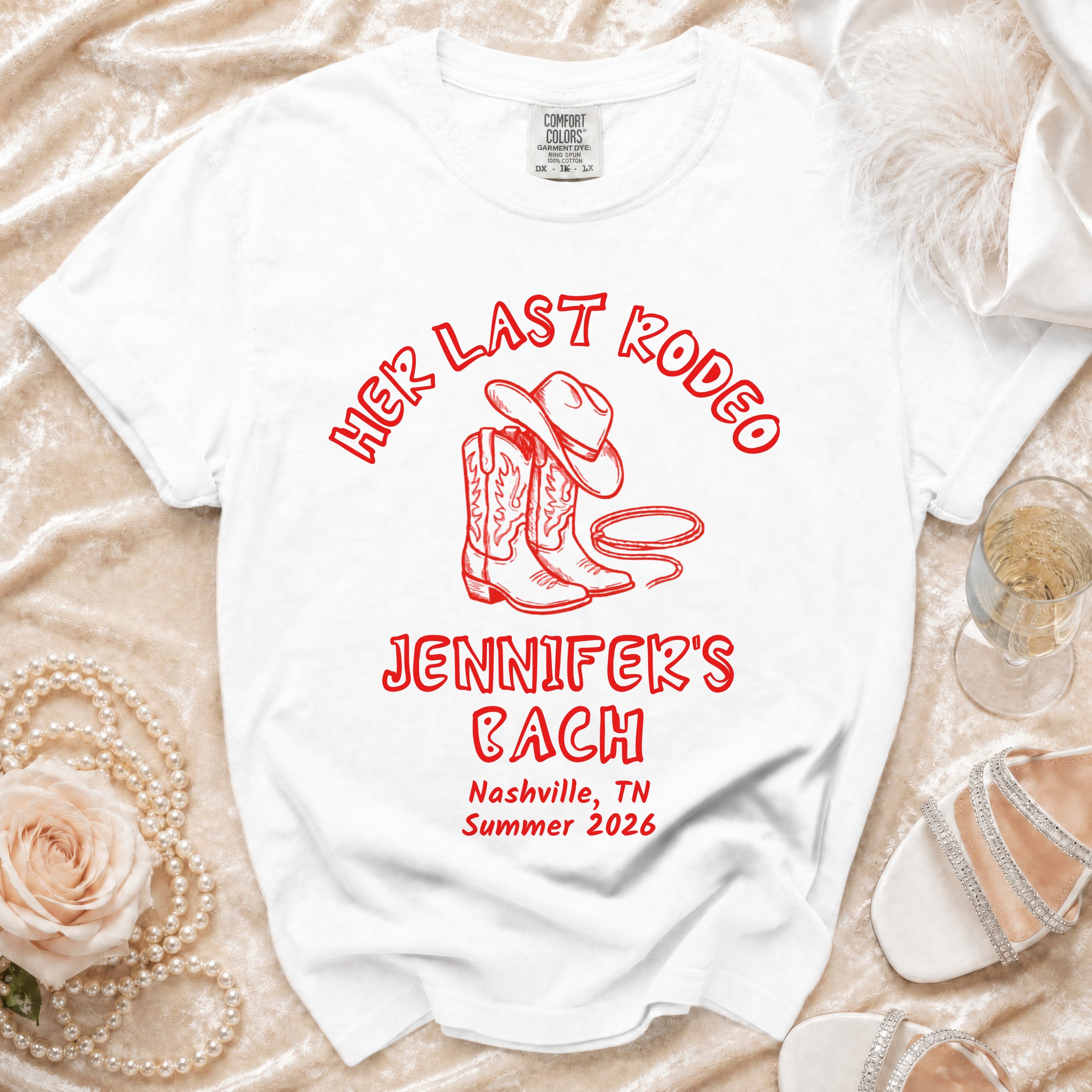 White t-shirt with "Her Last Rodeo Jennifer's Bach Nashville Summer 2026" text.