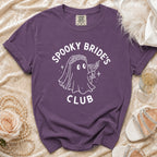 Purple t-shirt with "Spooky Bride's Club" ghost graphic and martini.