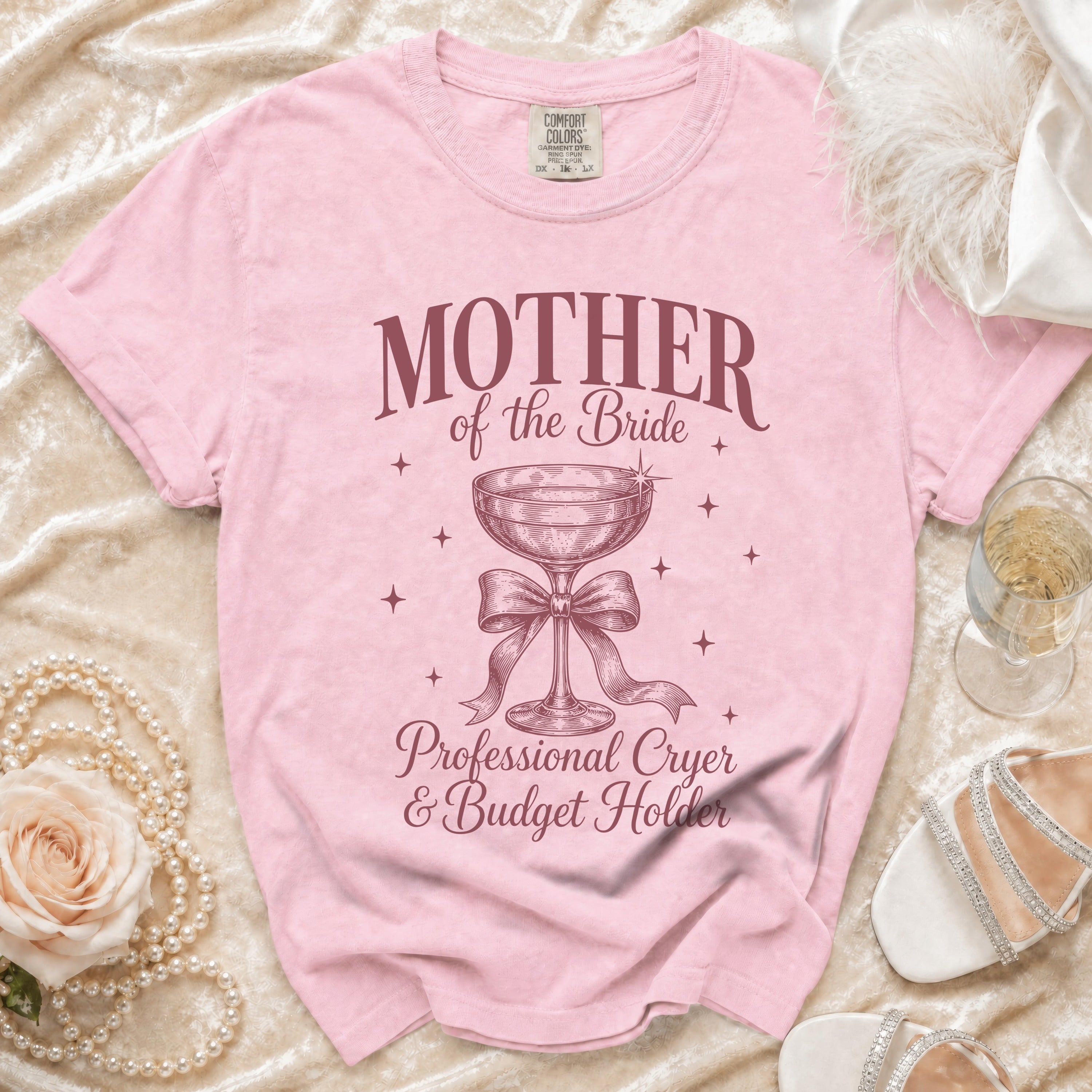 Pink t-shirt with "Mother of the Bride" and "Professional Cryer & Budget Holder" text.