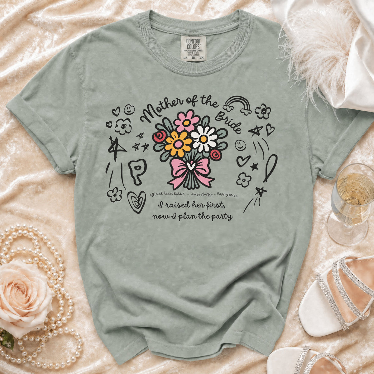 Mother of the Bride t-shirt with floral bouquet and playful text.