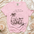 Pink t-shirt with "Just Married. Financially Irresponsible." graphic of couple on beach.