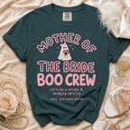 Teal t-shirt with pink "Mother of the Bride Boo Crew" graphic and text.