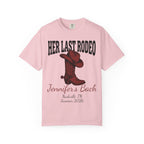 Pink t-shirt with "Her Last Rodeo" text and cowboy boot graphic.