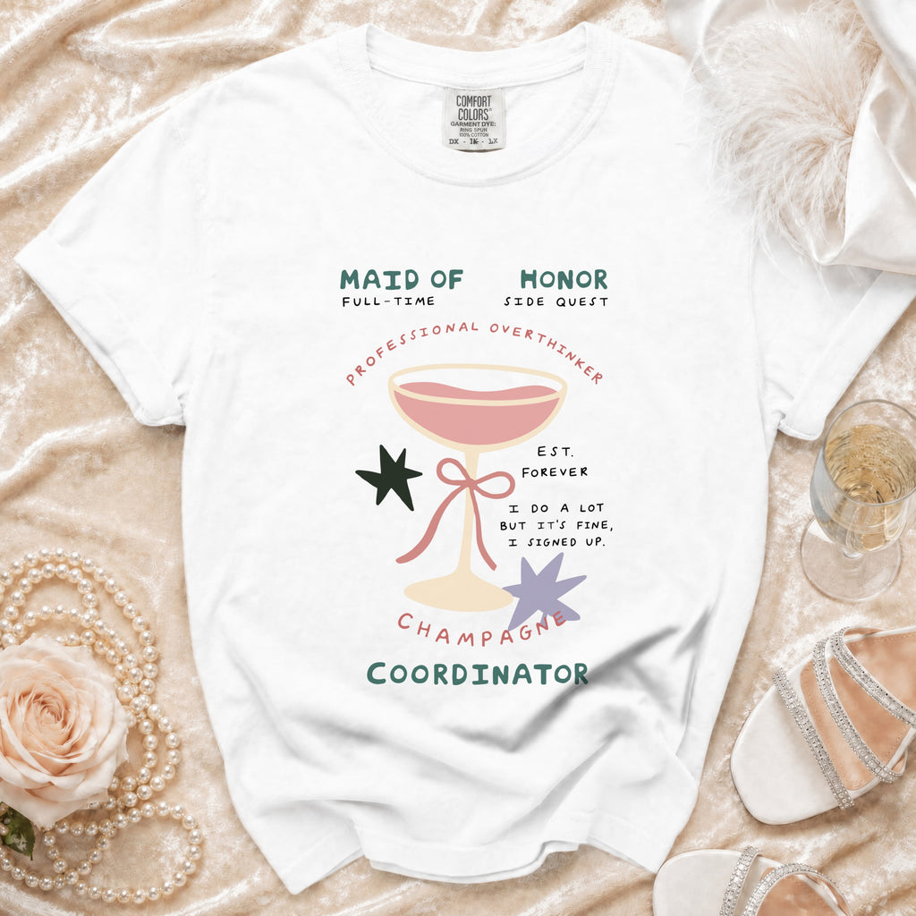 White t-shirt with "Maid of Honor" and "Champagne Coordinator" text.
