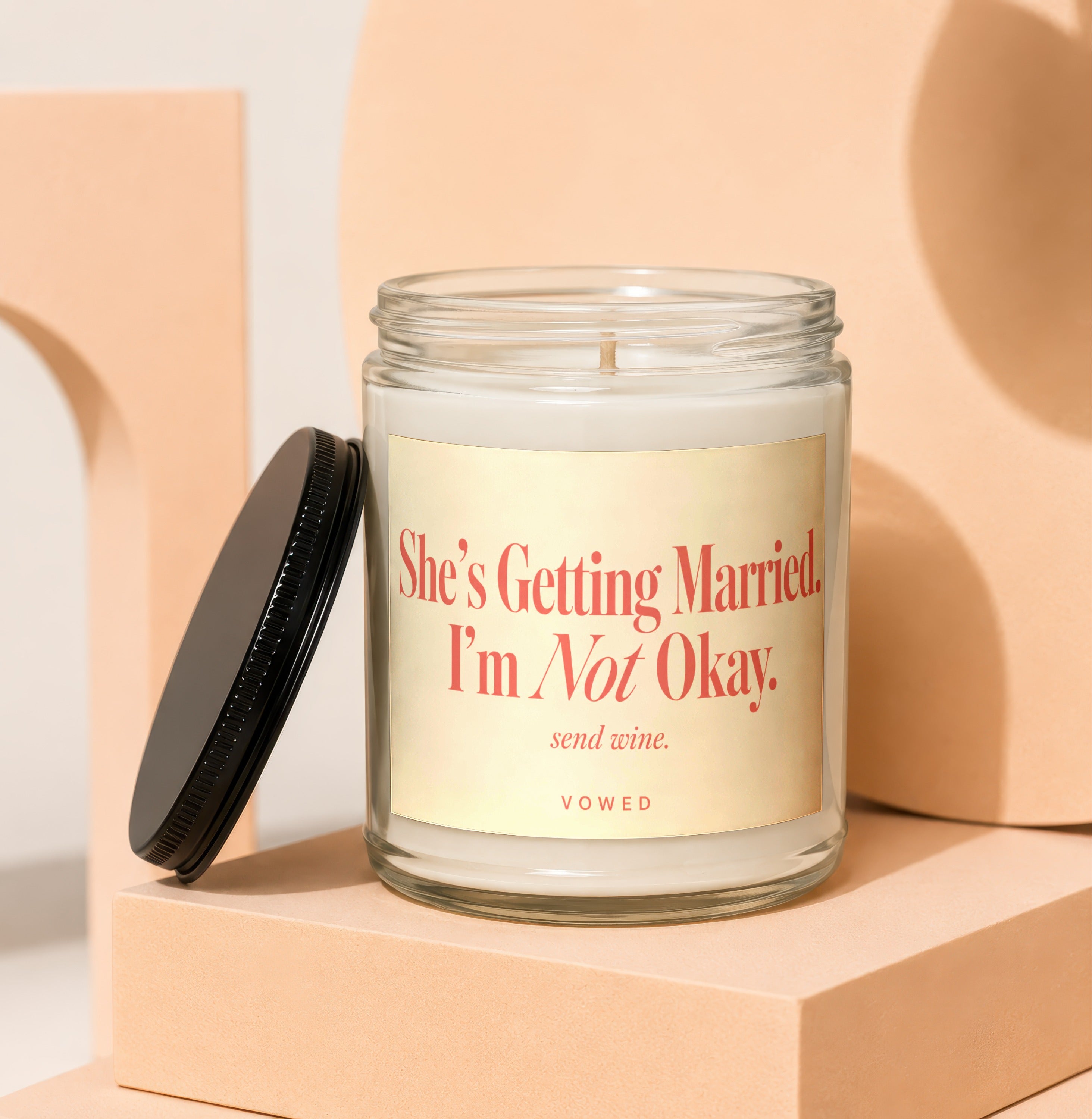 Candle with text She's Getting Married. I'm Not Okay. Send Wine.