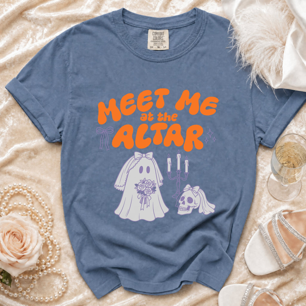 Blue t-shirt with "Meet Me at the Altar" text and ghost bride illustration.