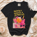 Black t-shirt with "Wifey Wants a Spritz" design featuring a drink and champagne bucket.