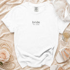 White t-shirt with "bride est. 2026" printed on it.