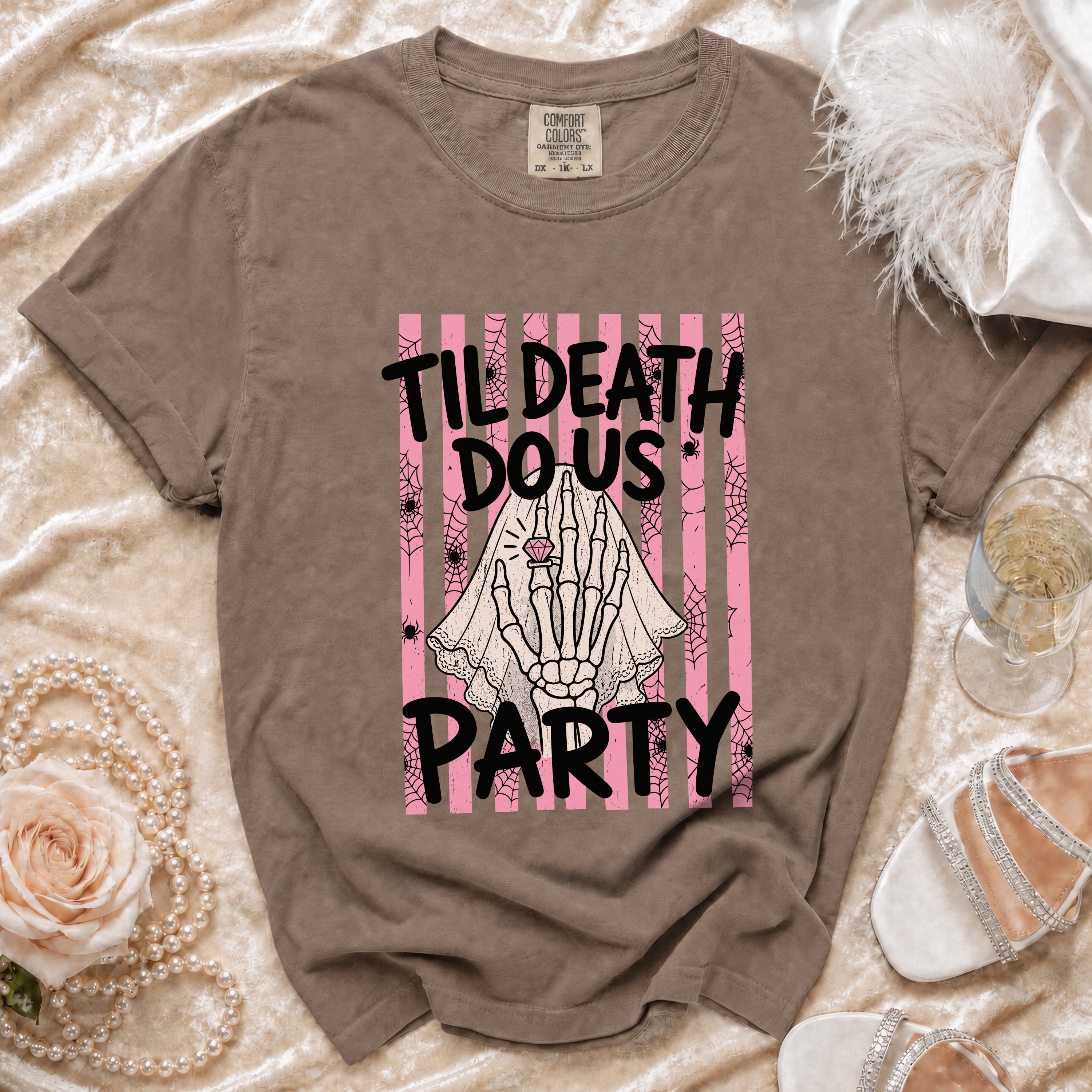 T-shirt with skeleton hand, ring, and text "Til Death Do Us Party".