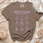 Brown Comfort Colors t-shirt with "Mother of the Bride" text and spooky wedding icons.