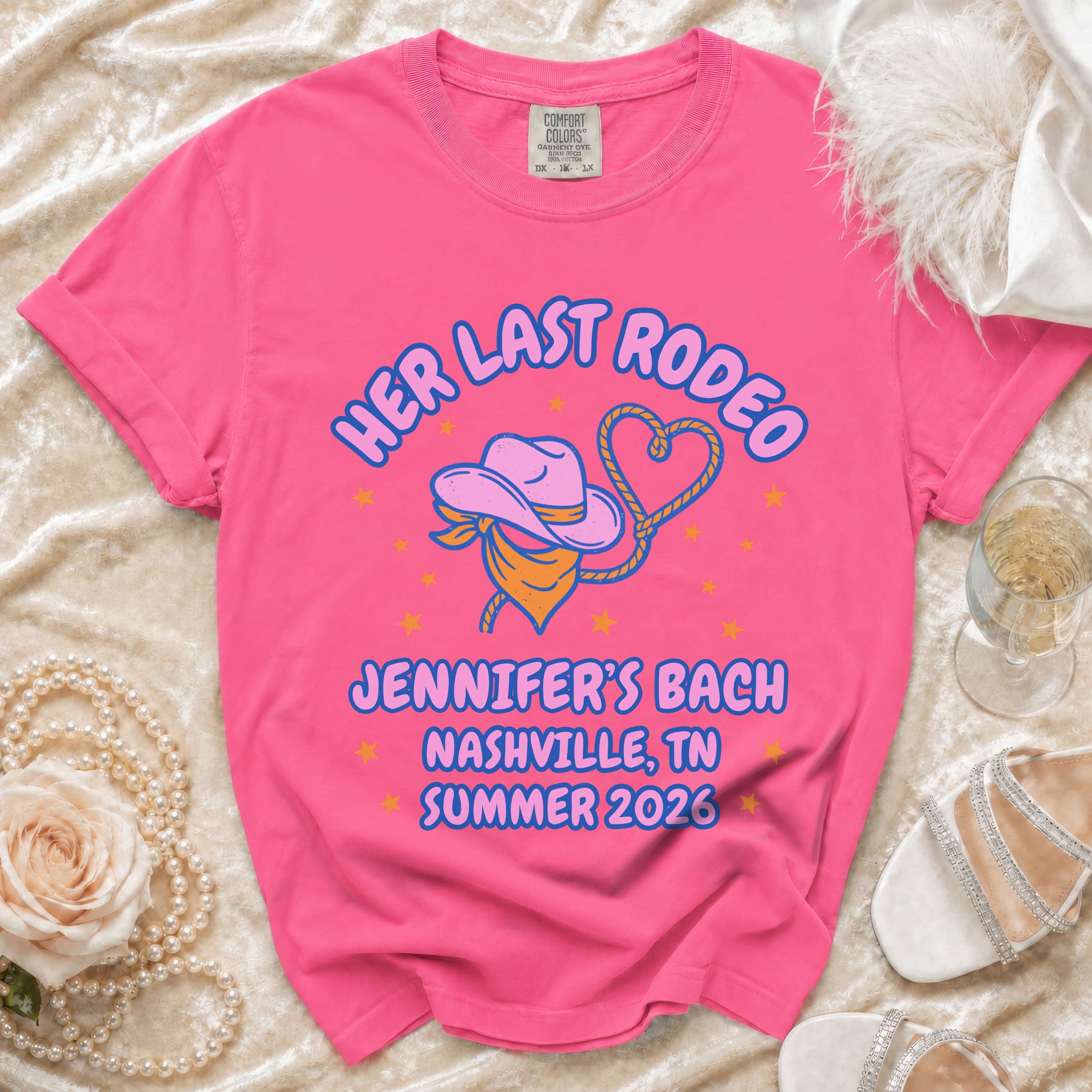 Pink t-shirt with "Her Last Rodeo" and bachelorette details for Nashville.
