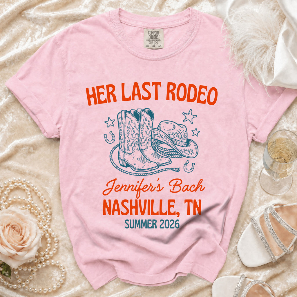 Pink t-shirt with "Her Last Rodeo Nashville, TN Summer 2026" text.