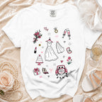 White t-shirt with wedding-themed illustrations including a dress, cake, and "Just Married" car.