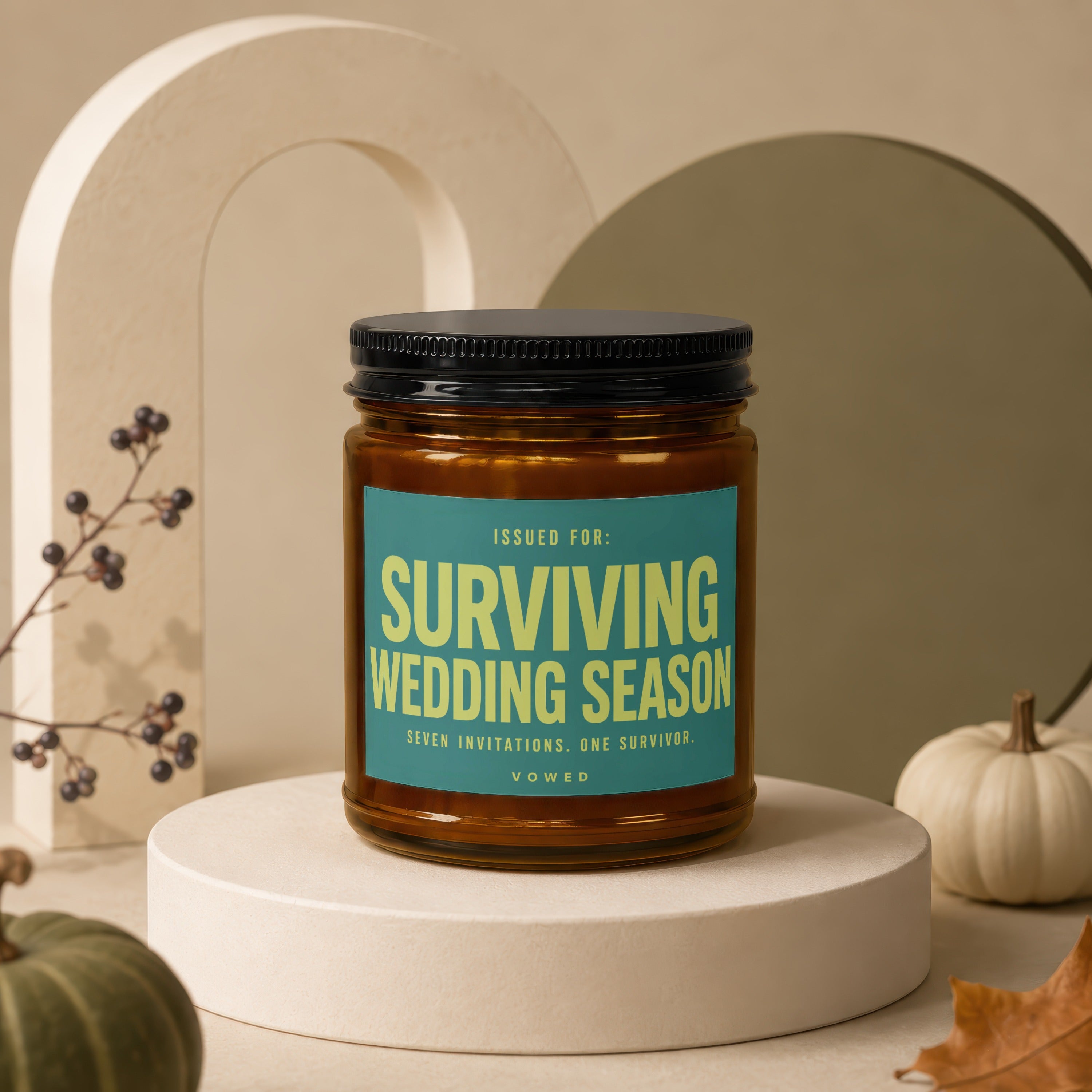 Candle with "Surviving Wedding Season" text, "Seven Invitations. One Survivor."