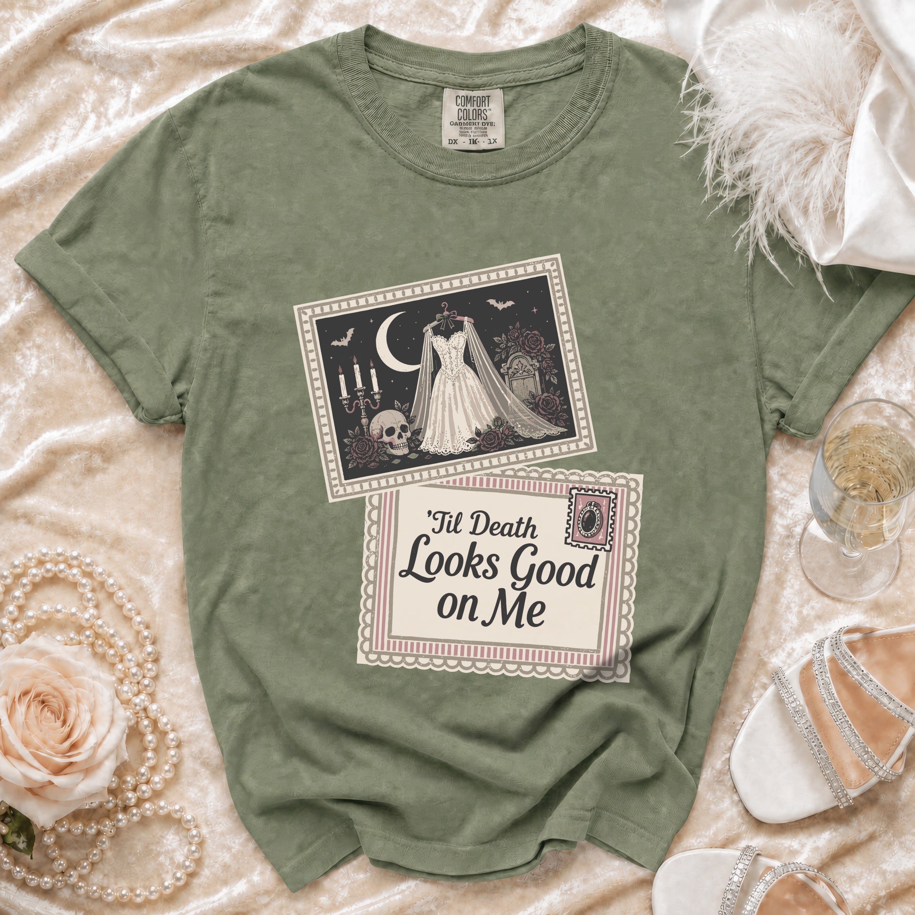 Olive green t-shirt with gothic bridal graphic and "Til Death Looks Good on Me" text.