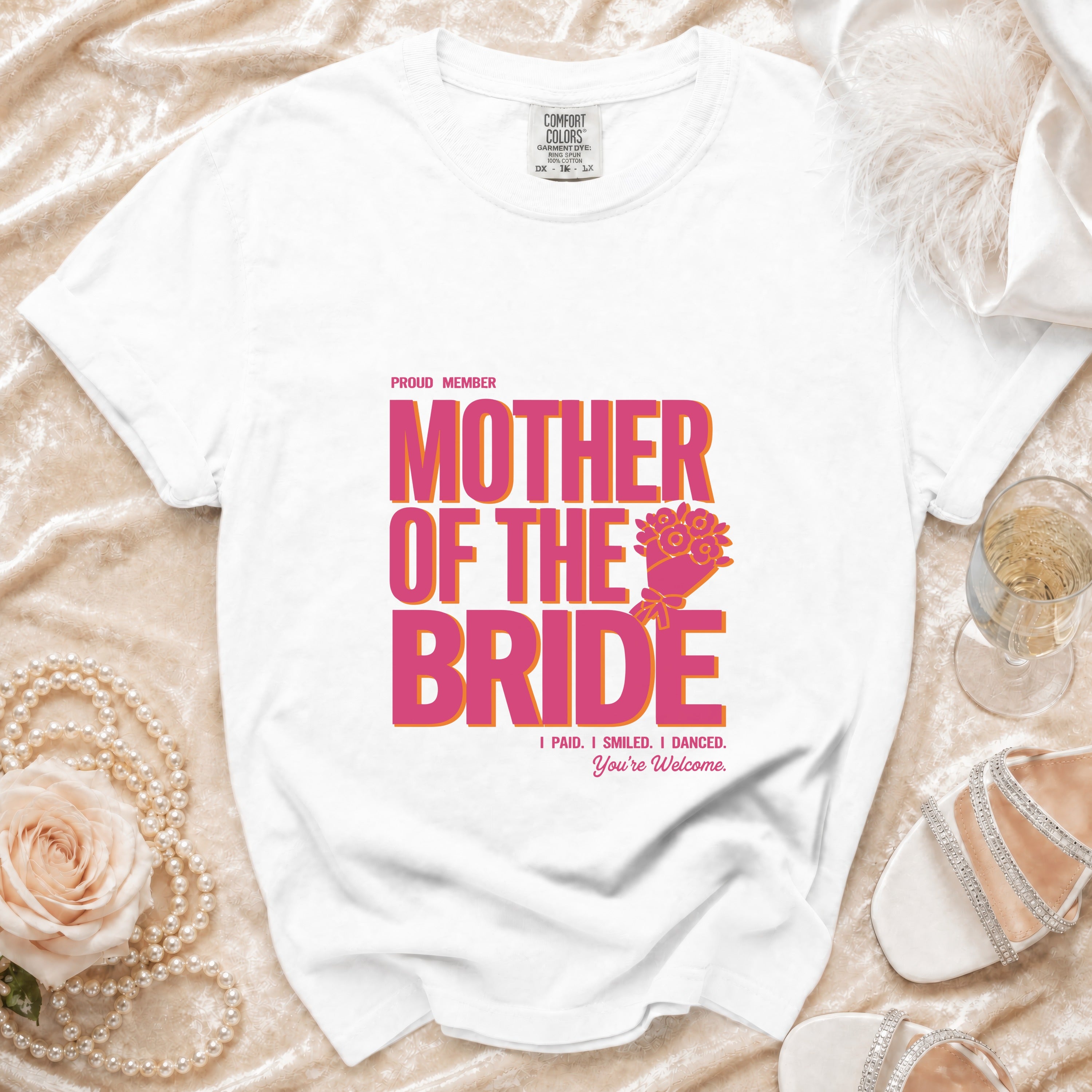 White t-shirt with "Proud Member Mother of the Bride" text and floral graphic.