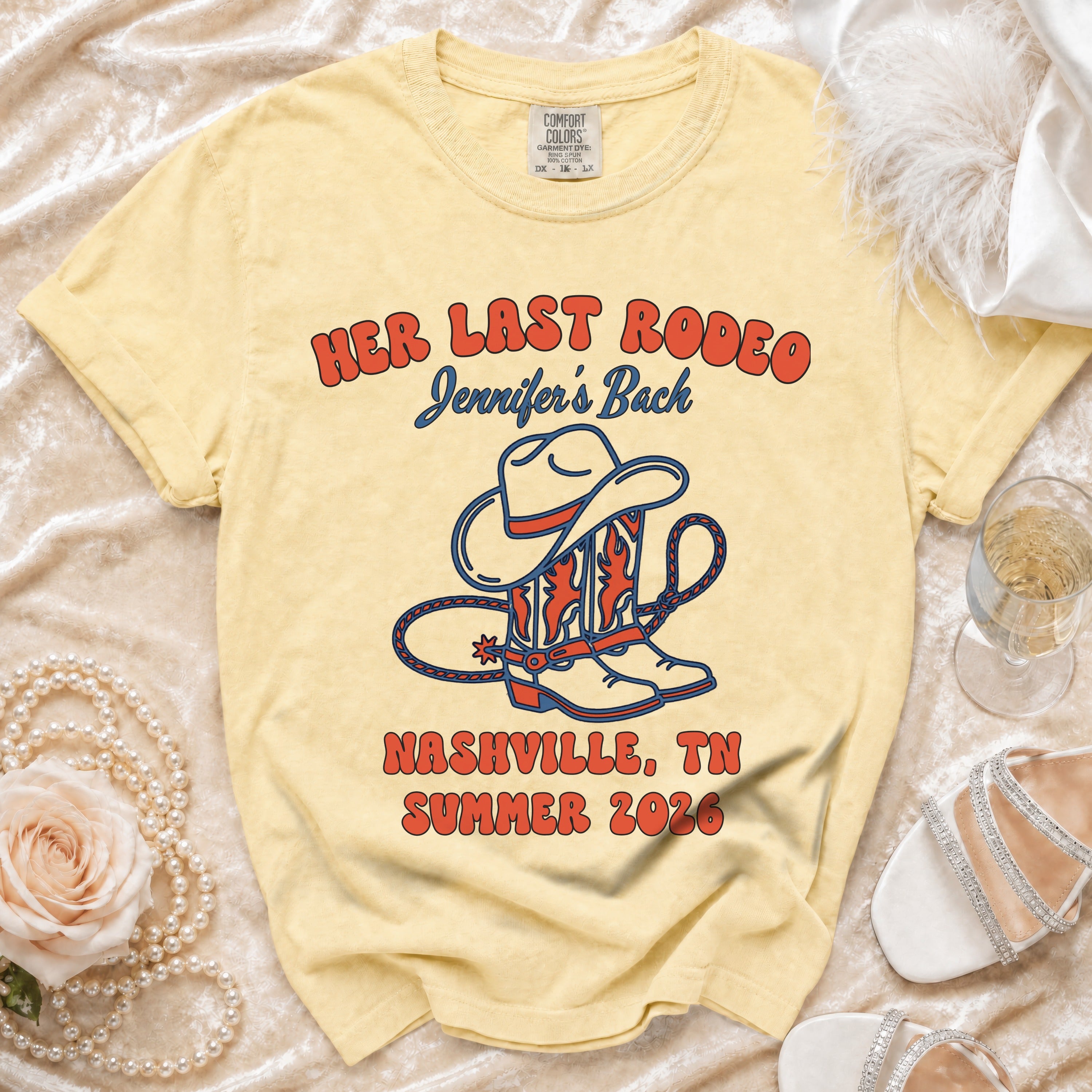 Yellow t-shirt with "Her Last Rodeo" text, cowboy boots, and hat graphic.