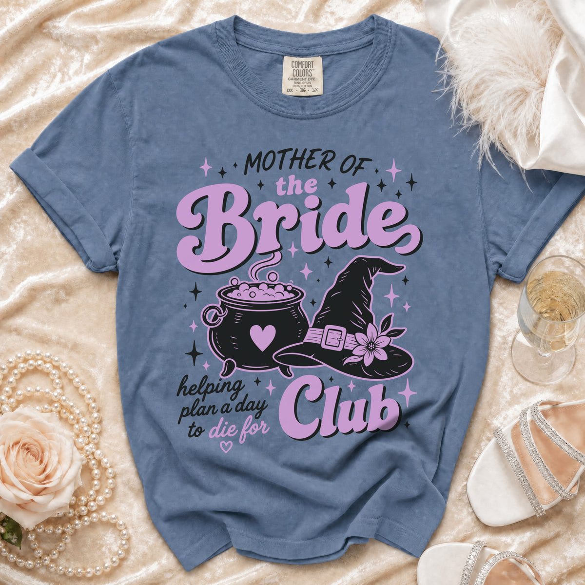 Blue t-shirt with "Mother of the Bride" and witchy graphics.