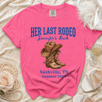 Pink t-shirt with "Her Last Rodeo" and cowboy boots graphic.