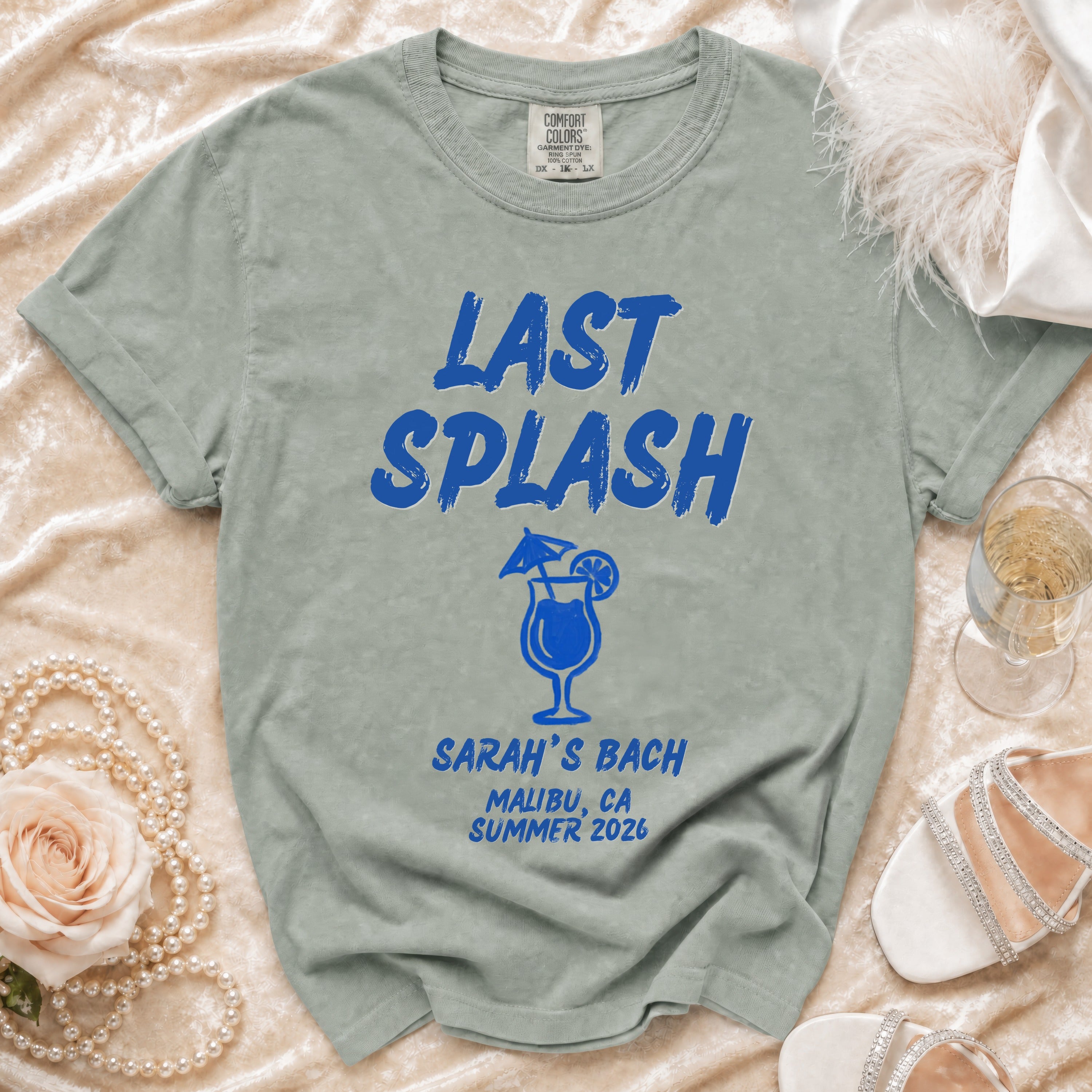 Comfort Colors t-shirt with "Last Splash" and "Sarah's Bach" in blue text.