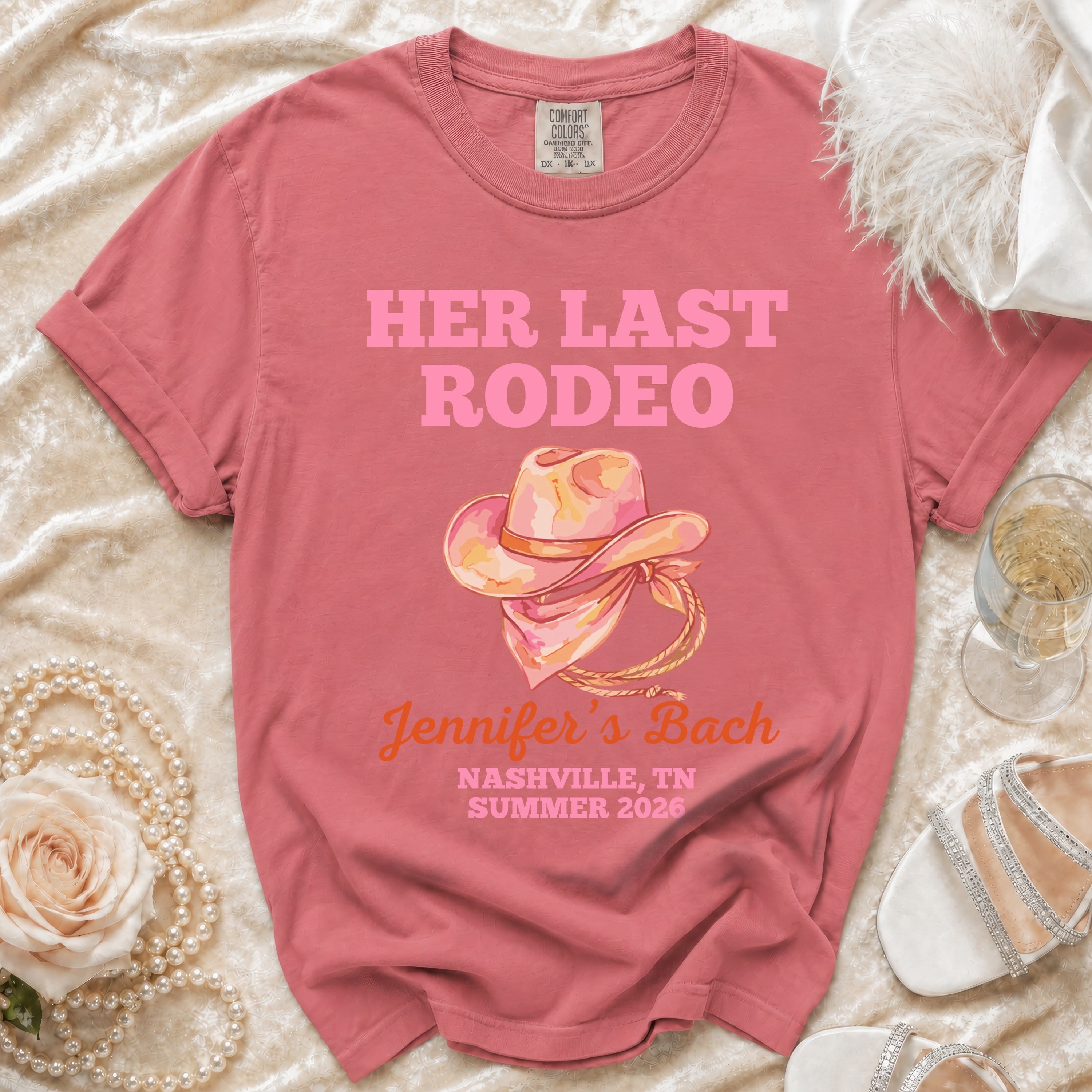 Rose pink t-shirt with "Her Last Rodeo" text and cowboy hat graphic for Jennifer's Bach.