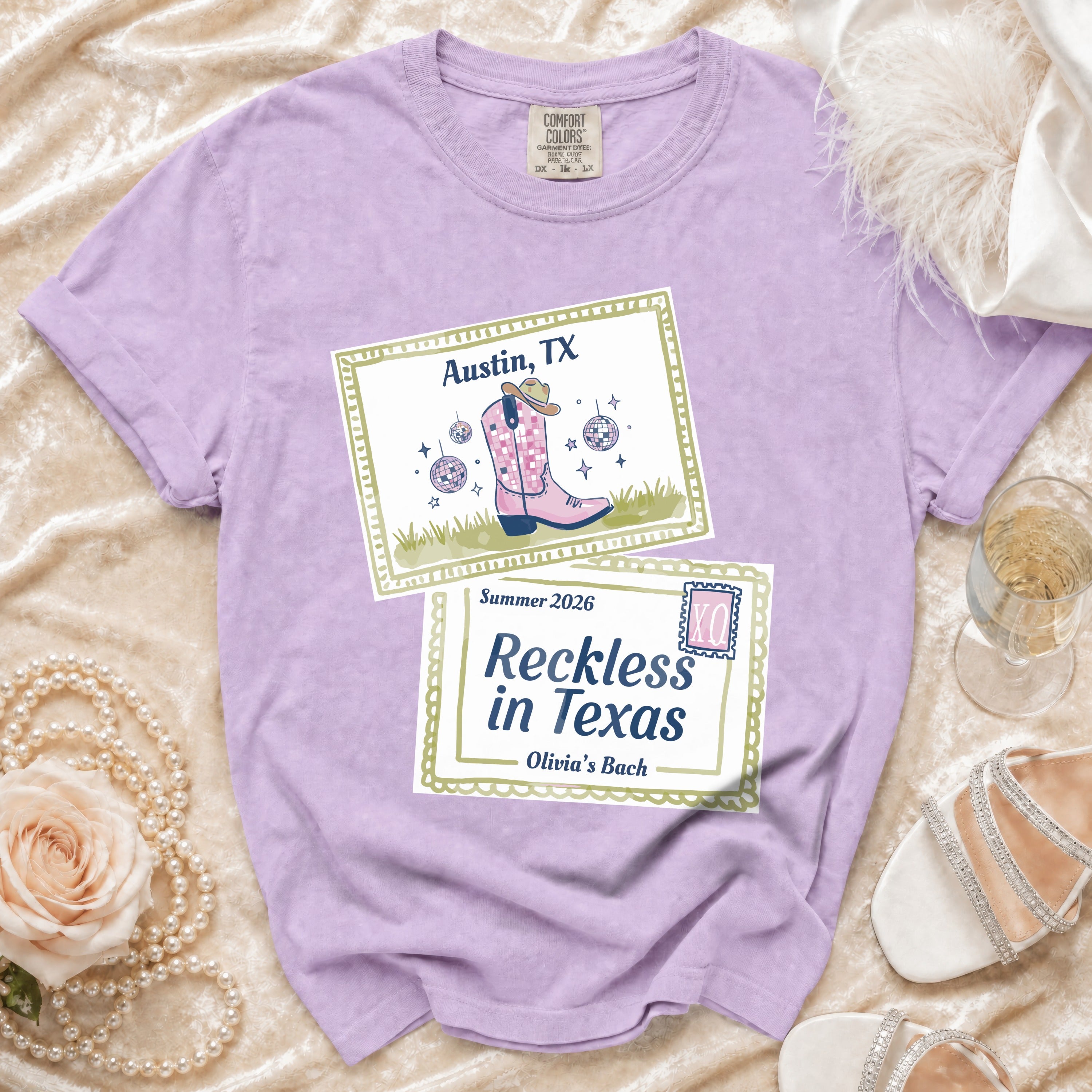 Purple t-shirt with "Austin, TX", "Summer 2026", and "Reckless in Texas" text.