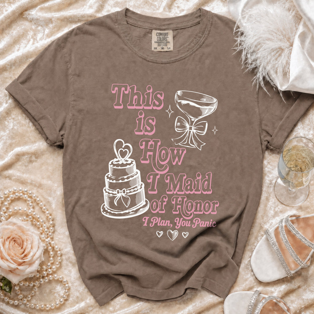 Brown t-shirt with pink text and graphics: "This is How I Maid of Honor I Plan, You Panic".