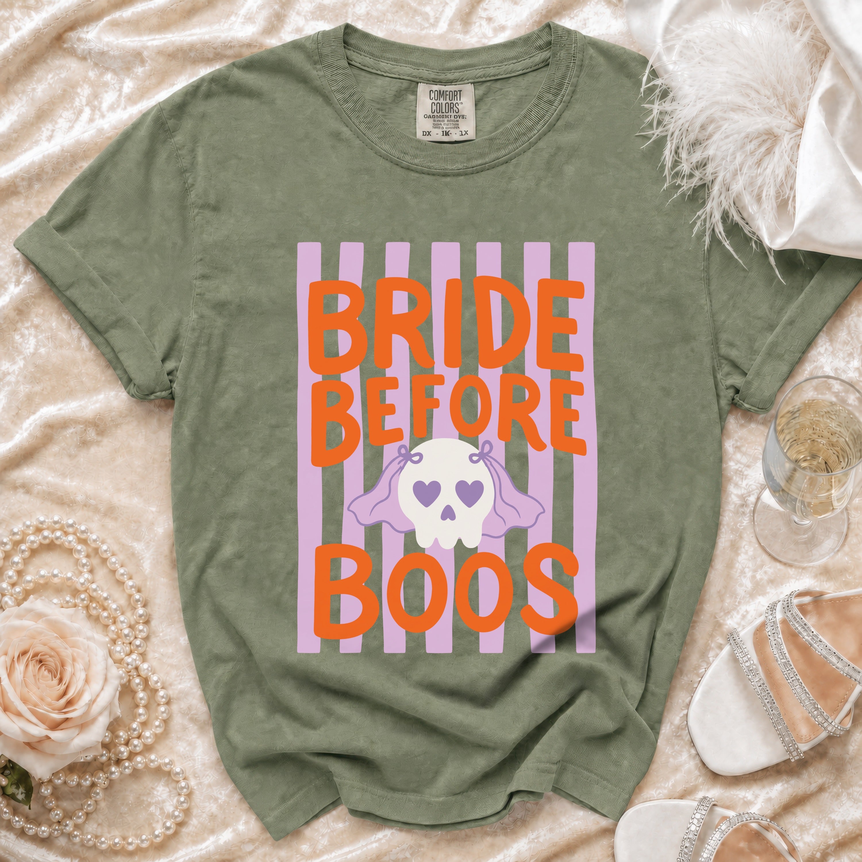 Olive green t-shirt with "Bride Before Boos" text and skull graphic.