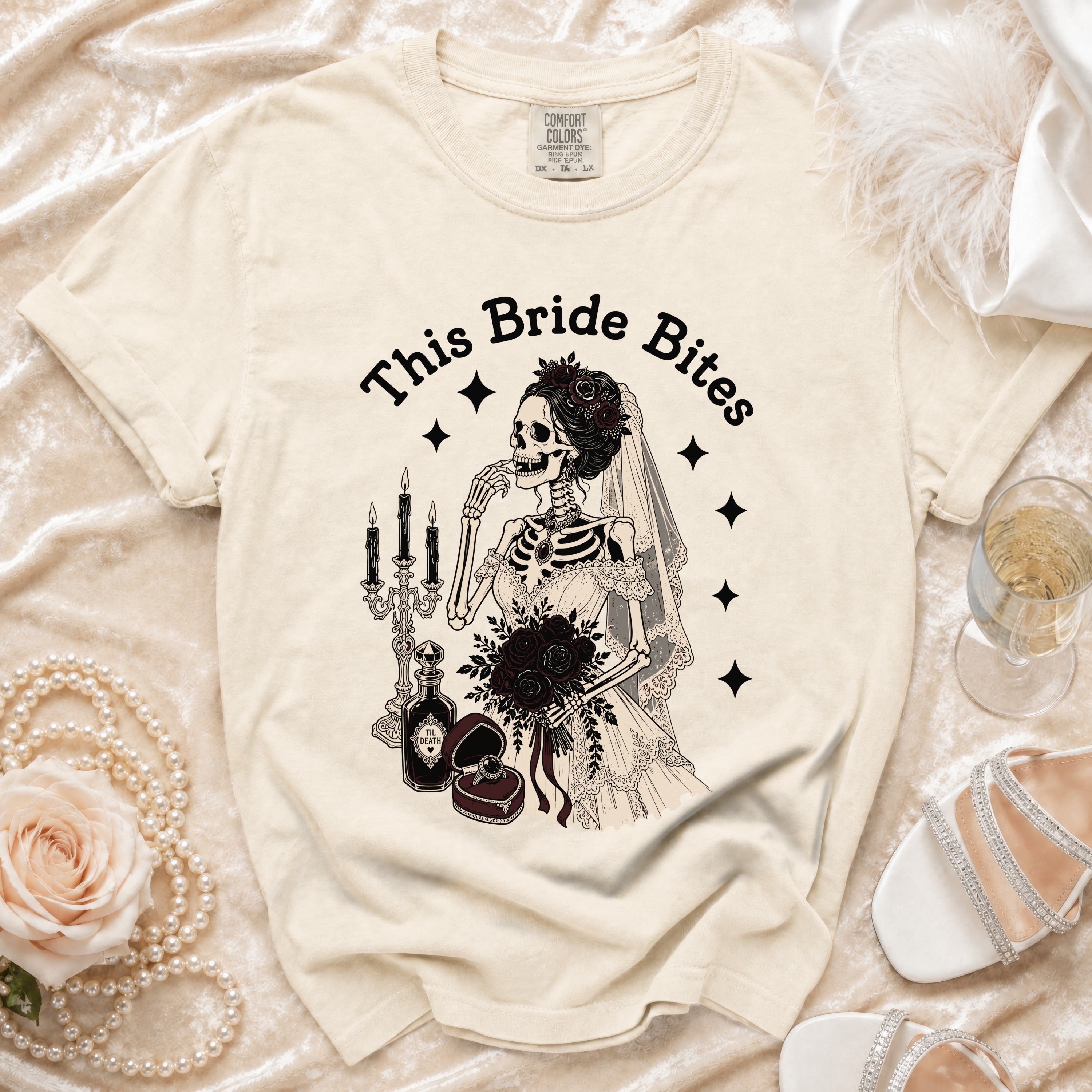 Skeleton bride graphic t-shirt with "This Bride Bites" text.