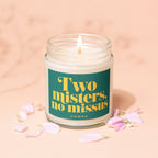 Glass jar candle with teal label reading "Two misters, no missus, vowed."