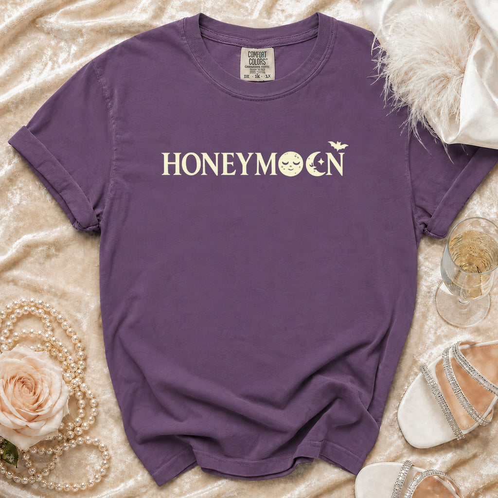 Purple t-shirt with "HONEYMOON" text and moon and bat graphics.