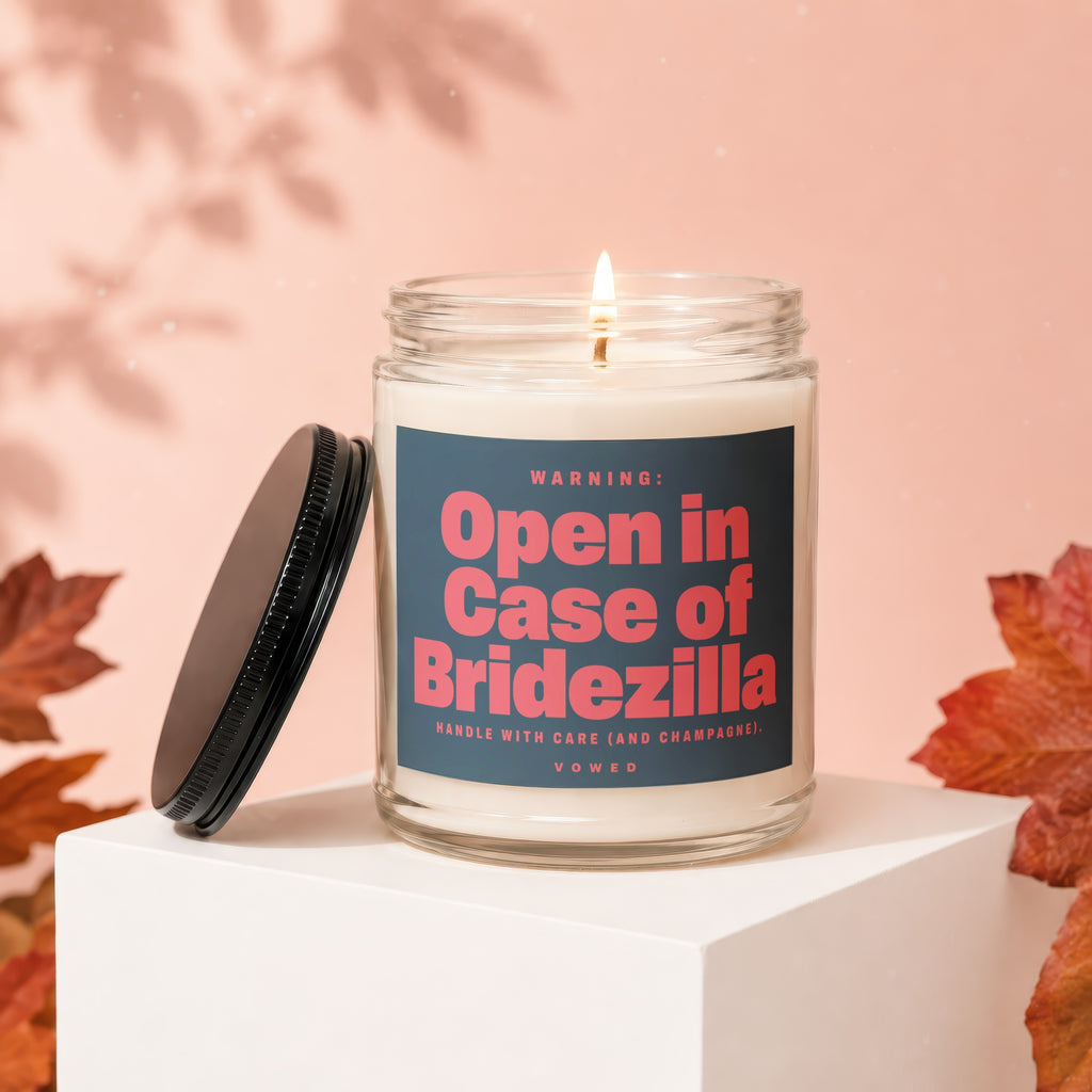 Scented candle with "Open in Case of Bridezilla" warning label.