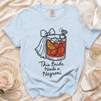 Light blue t-shirt with a graphic of a cocktail and text that reads "This Bride Needs a Negroni."