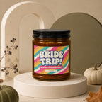 Amber jar candle with "BRIDE TRIP! BACHELORETTE WEEKEND LOADING VOWED" label.