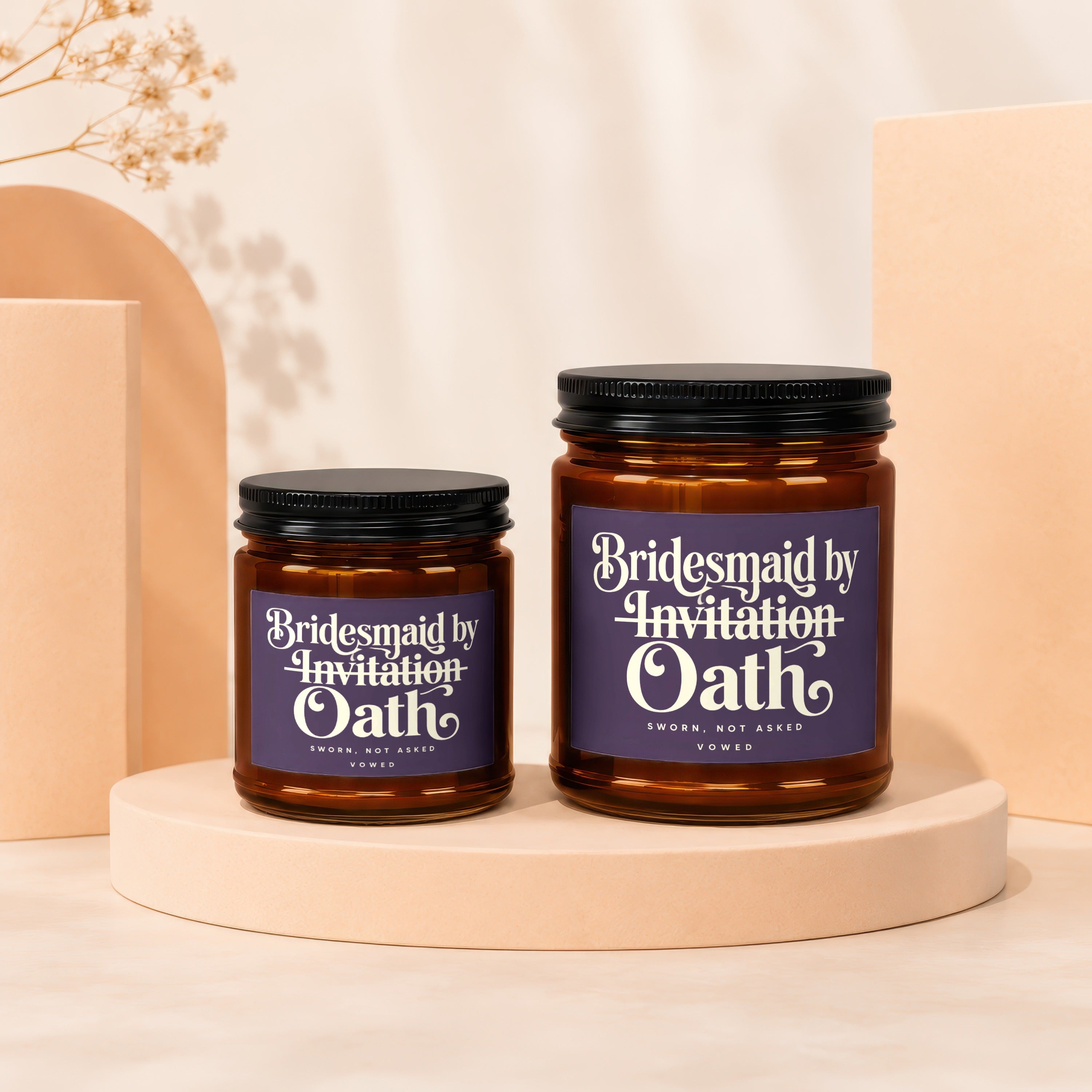Two amber jars with black lids, labeled "Bridesmaid by Invitation Oath."