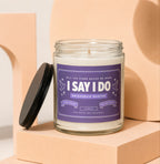 Candle with "I Say I Do Bridesmaid Wanted" label, hand-poured soy wax blend.