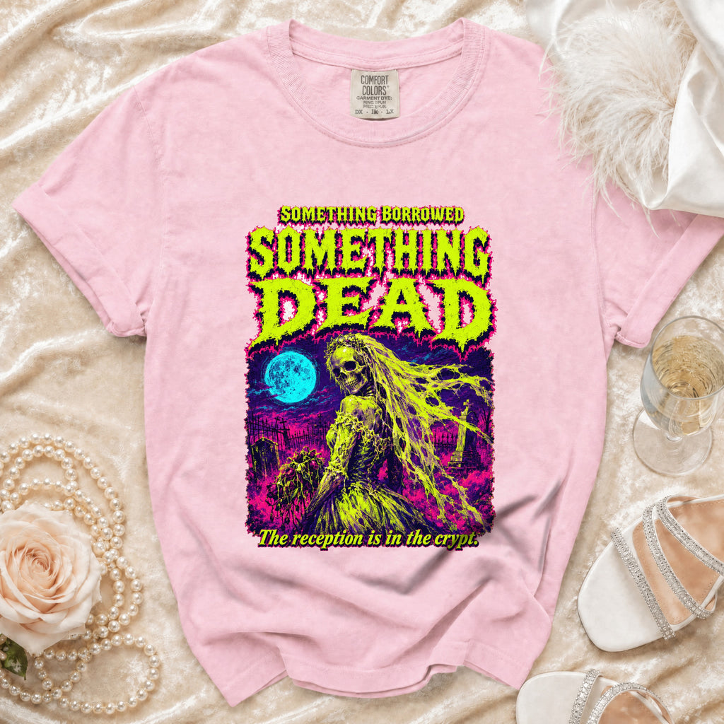 Pink t-shirt with "SOMETHING BORROWED SOMETHING DEAD" graphic and skeleton bride.