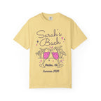 Yellow t-shirt with "Sarah's Bach Malibu, CA Summer 2026" and champagne glasses.
