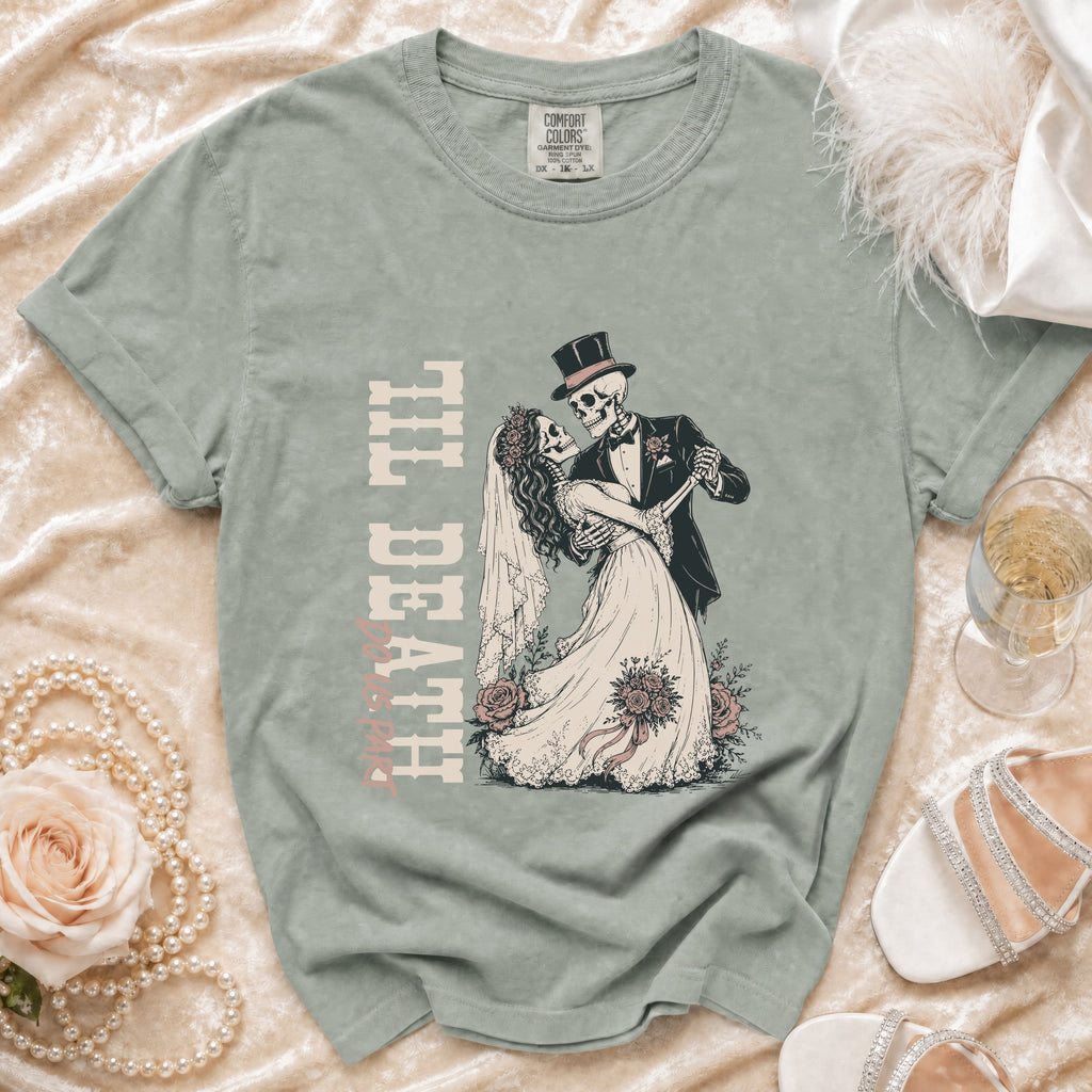 T-shirt graphic of skeletons in wedding attire with text "Til Death Do Us Part".