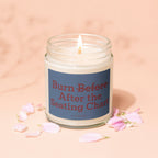 Candle with "Burn Before After the Seating Chart" text and pink petals.