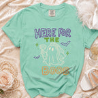 Mint t-shirt with "HERE FOR THE BOOS" text and a ghost holding a drink.