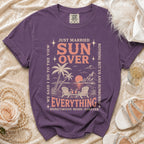 Purple t-shirt with "Just Married Sun Over Everything Honeymoon Mode: Forever" text and beach graphic.