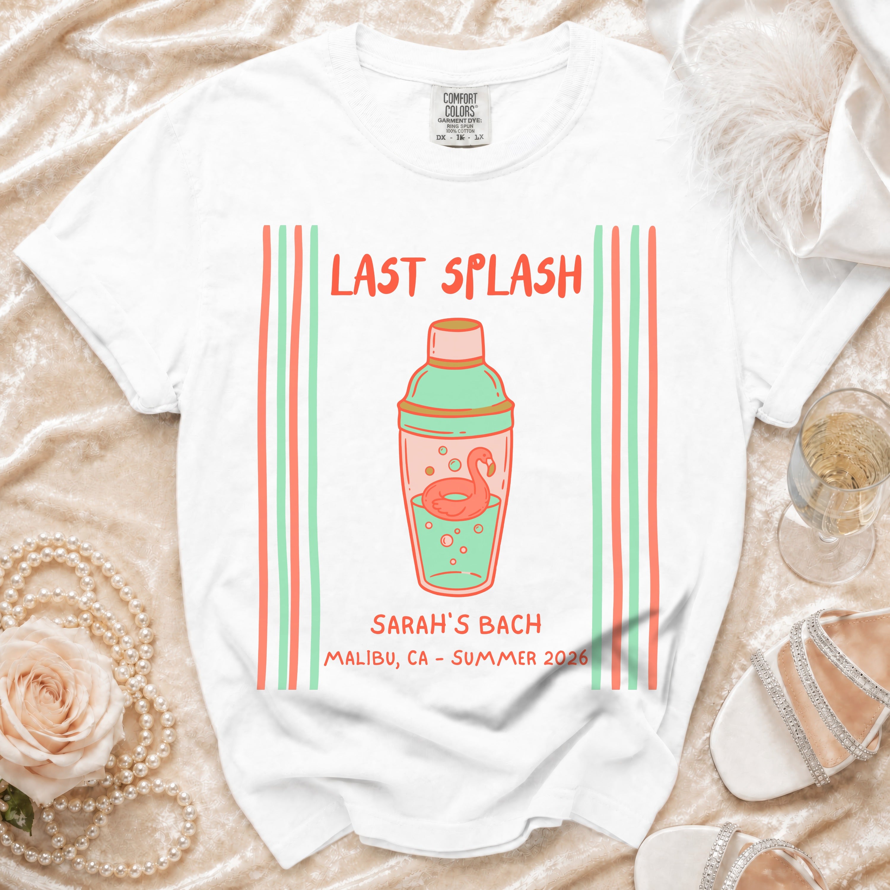 White t-shirt with "Last Splash" text, cocktail shaker, and "Sarah's Bach Malibu Summer 2026".