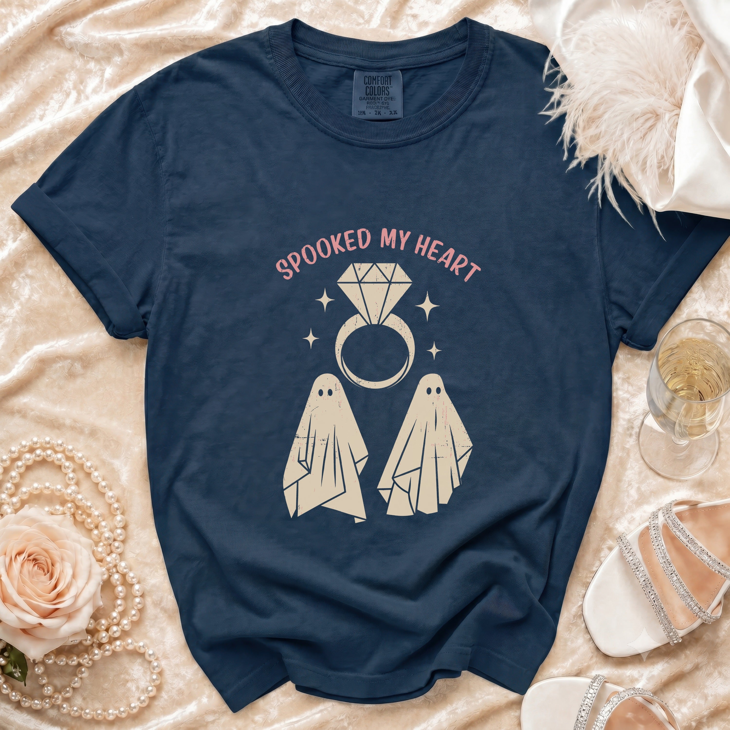 Dark blue t-shirt with "Spooked My Heart" text, ghosts, and diamond ring design.